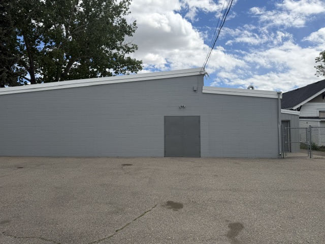 Commercial block building repainted grey