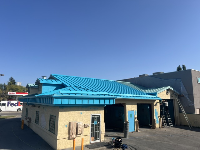 Commercial building exterior during painting